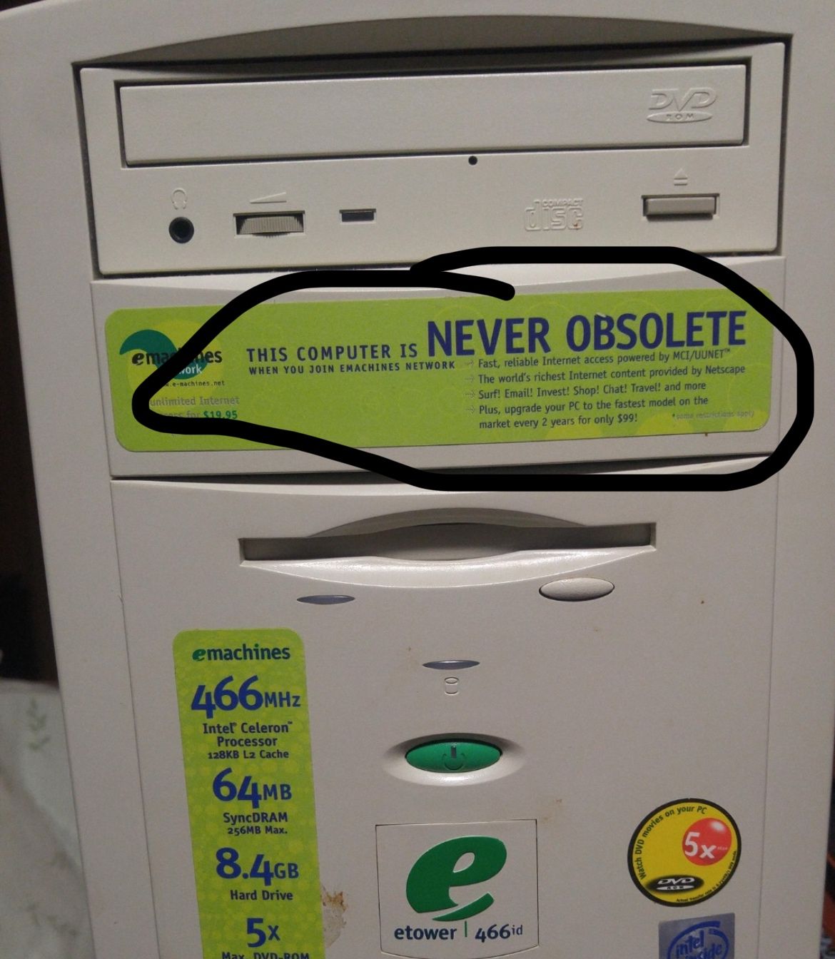 Picture of an early 90s IBM PC Clone with the equivalent power of an early Pentium - the 'Emachine' - with a sticker on it saying 'This machine will never be obsolete and that you can upgrade your computer after 2 years for only $100'